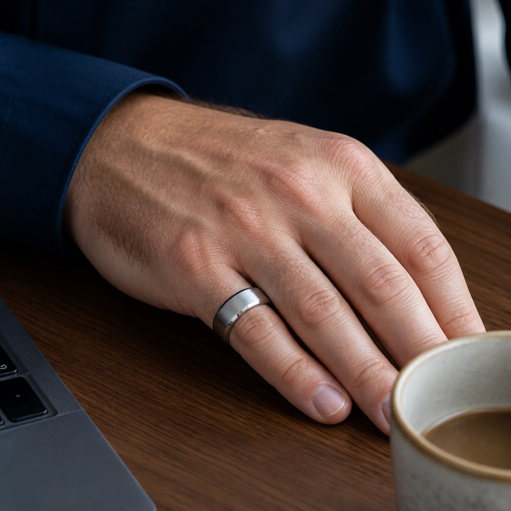 Alex wearing VYORA ring at desk